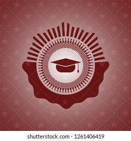 graduation cap icon inside red emblem