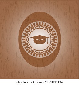 graduation cap icon inside retro wooden emblem