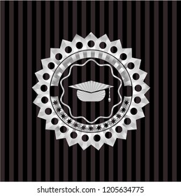 graduation cap icon inside silvery emblem