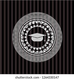 graduation cap icon inside silvery badge or emblem