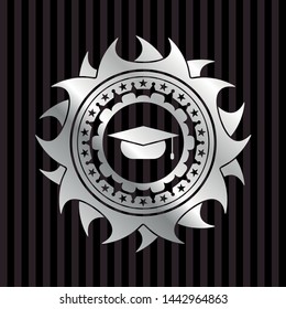 graduation cap icon inside silvery emblem