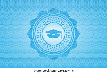 graduation cap icon inside sky blue water wave style badge.