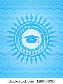 graduation cap icon inside water wave representation badge.