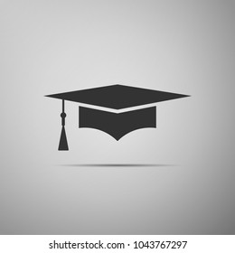 Graduation cap icon isolated on grey background. Graduation hat with tassel icon. Flat design. Vector Illustration