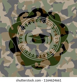 graduation cap icon on camo texture