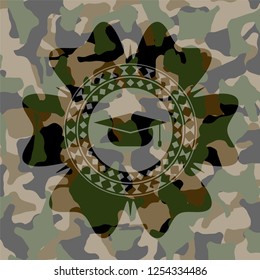 graduation cap icon on camouflage texture