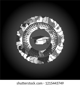 graduation cap icon on grey camouflaged pattern