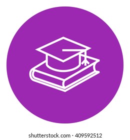 Graduation cap laying on book line icon.