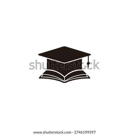 Graduation cap placed on an open book symbolizing academic achievement and educational success