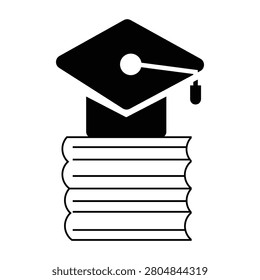 Graduation cap sitting atop a pile of books, illustrating academic achievement, learning, and scholarly pursuits.