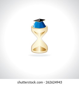 graduation cap top of the sand clock 
