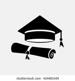 Graduation hat and graduation diploma.