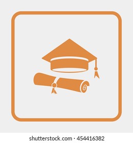 Graduation hat and graduation diploma.