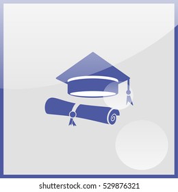 Graduation hat and graduation diploma.