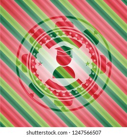 graduation icon inside christmas emblem.
