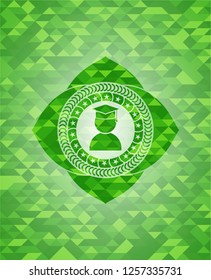 graduation icon inside green emblem with triangle mosaic background