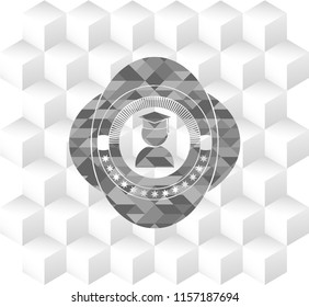 graduation icon inside grey emblem with cube white background