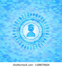 graduation icon inside light blue mosaic emblem