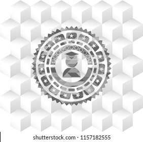graduation icon inside realistic grey emblem with geometric cube white background