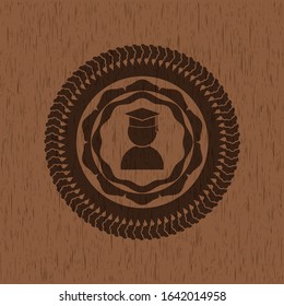 graduation icon inside realistic wooden emblem