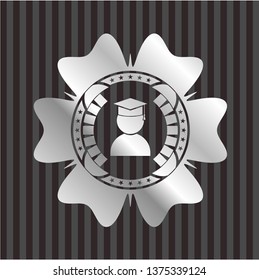 graduation icon inside silvery emblem or badge