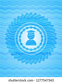 graduation icon inside sky blue water style emblem.