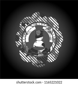 graduation icon on grey camo pattern