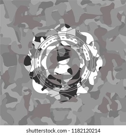 graduation icon on grey camo texture