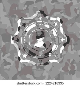 graduation icon on grey camo texture