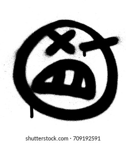 Graffiti angry emoji sprayed in black on white