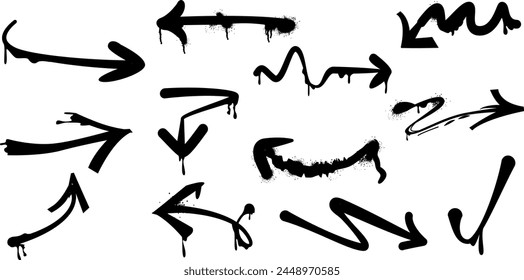 Graffiti arrows. Black arrows painted with a spray can, set.