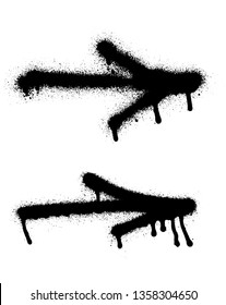 Graffiti arrows set with overspray in black over white.