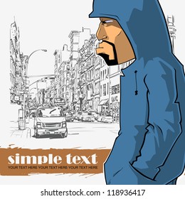 Graffiti character on a street-background. Place for your text.