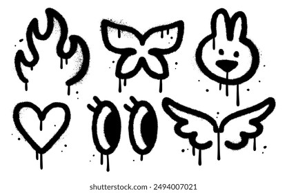 Graffiti drawing symbols set. Spray Painted graffiti of fire, butterfly, bunny, heart, eyes and wings. Sprayed paint elements. Street art style illustration. Vector.