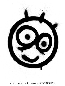Graffiti funny emoji sprayed in black on white