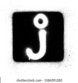 graffiti J font sprayed in white over black square