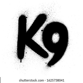 graffiti K9 abbreviation sprayed in black over white