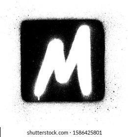 graffiti M font sprayed in white over black square