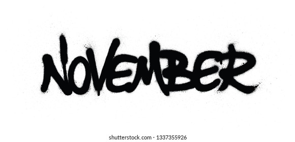graffiti november word sprayed in black over white