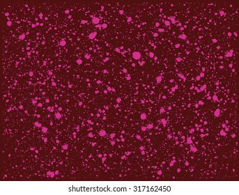 graffiti paint splatter pattern in pink over deep red