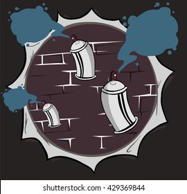 graffiti spray cans against a brick wall