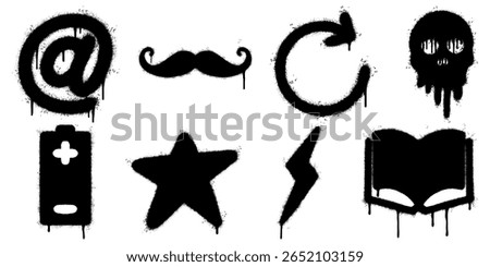 Graffiti Stencil Icon Set in Black Spray Paint Style on White Background. Including symbols at, mustache, reloading, arrows, skulls, batteries, stars, lightning, and open books.