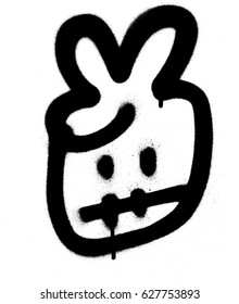Graffiti surprised emoji sprayed in black on white