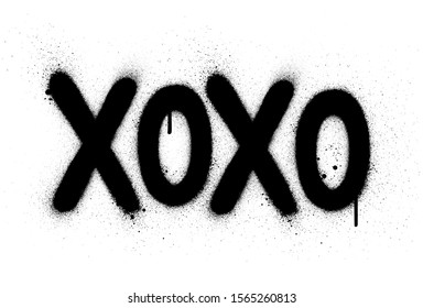 graffiti XOXO sign sprayed in black over white