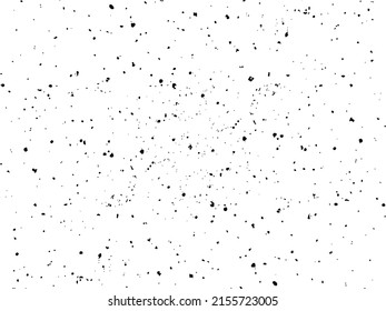 Grainy texture, black spots on white background