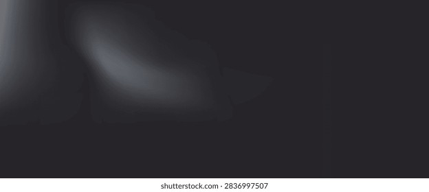 Grainy textured surface backlit, casting dramatic shadowy gradient across darkened plane