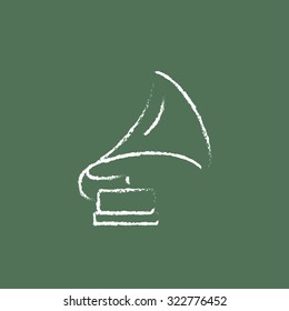 Gramophone hand drawn in chalk on a blackboard vector white icon isolated on a green background.