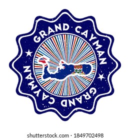 Grand Cayman round grunge stamp with island map and country flag. Vintage badge with circular text and stars, vector illustration.