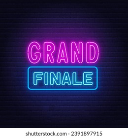 Grand Finale neon sign on brick wall background.