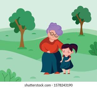 Grand mother embracing grand daughter child. Grandma smiling with love hugging his laughing granddaughter. Generations & family relationship. granny and her little grandchild walking together in park